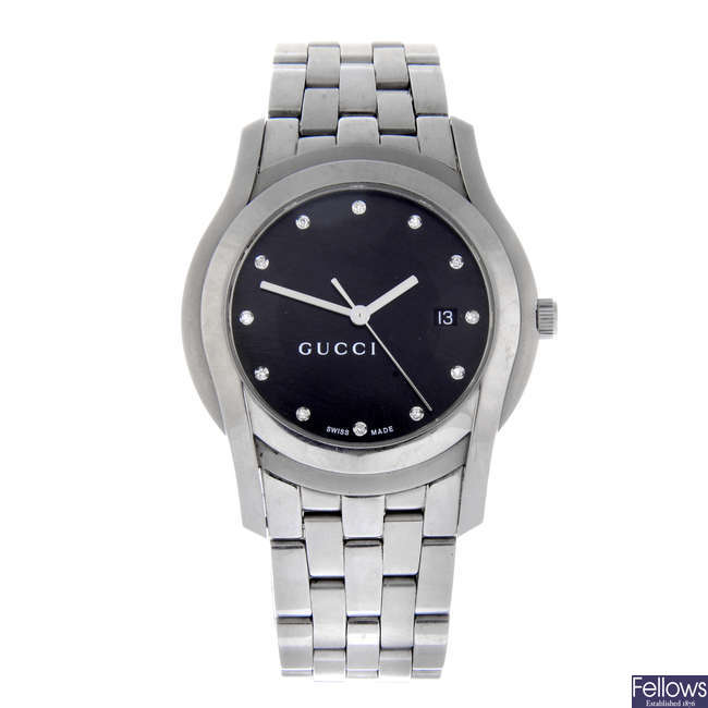 GUCCI - a stainless steel 5500XL bracelet watch with a gentleman's stainless steel Gucci 8500M bracelet watch and a lady's stainless steel Gucci 3900L wrist watch.