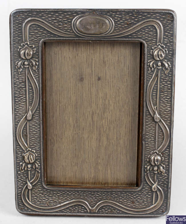 An early 20th century silver mounted photograph frame in Art Nouveau style.