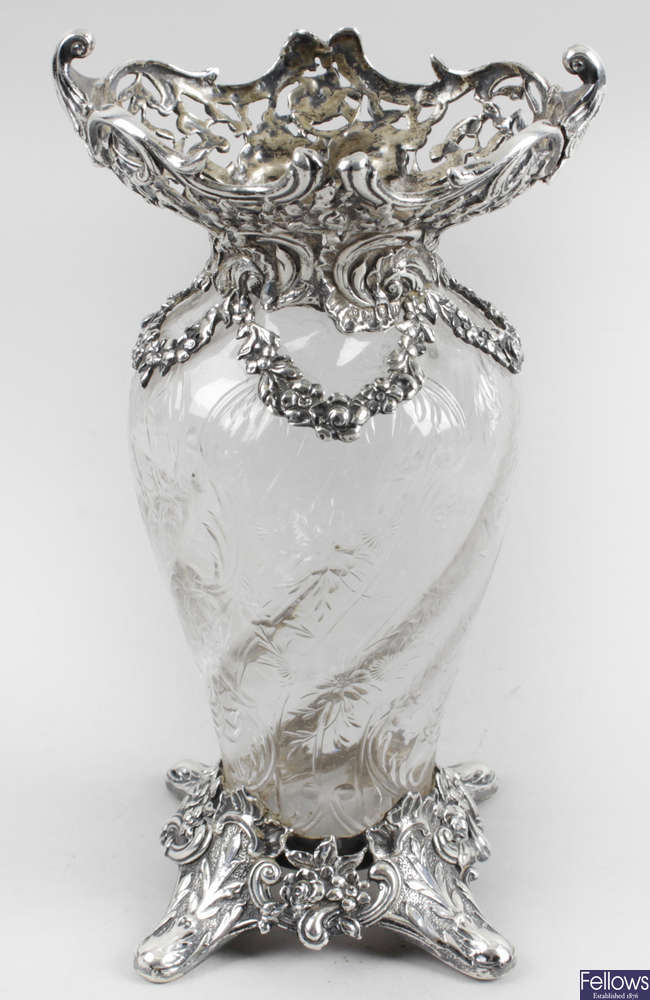 An Edwardian silver mounted glass vase. 