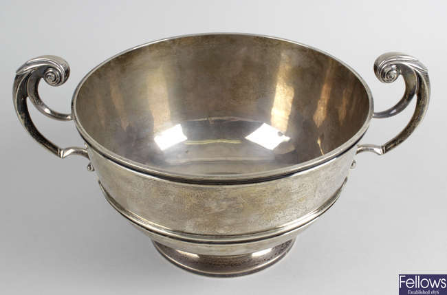 An Edwardian silver twin-handled bowl on footed base.