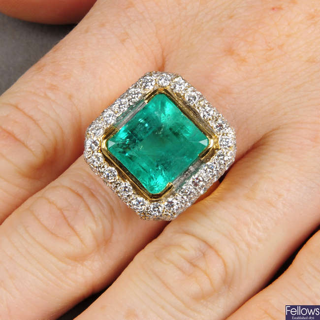 A Colombian emerald and pave-set diamond cluster ring.