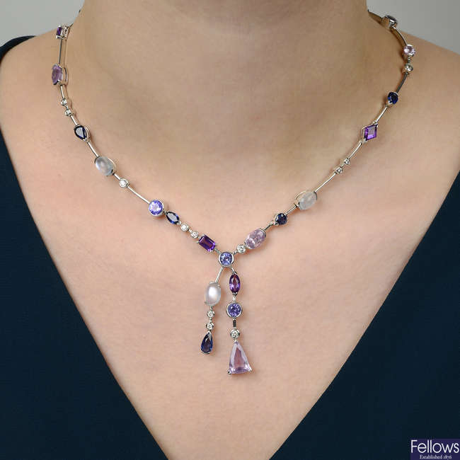 An 18ct gold diamond, sapphire, moonstone, spinel and amethyst necklace.