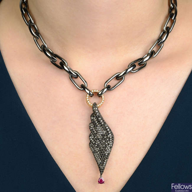 A ruby, diamond and black gem 'Wings of Desire' pendant, with chain, by Gavello.