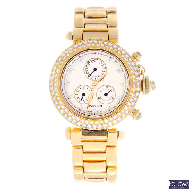 CARTIER - an 18ct yellow gold Pasha chronograph bracelet watch.