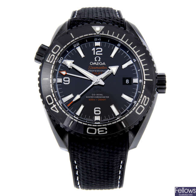 CURRENT MODEL: OMEGA - a gentleman's ceramic Seamaster 600m Planet Ocean Deep black GMT wrist watch.