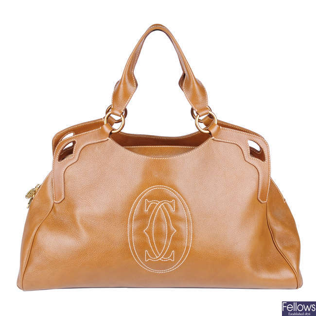 CARTIER - a large tan leather Marcello De Cartier handbag.