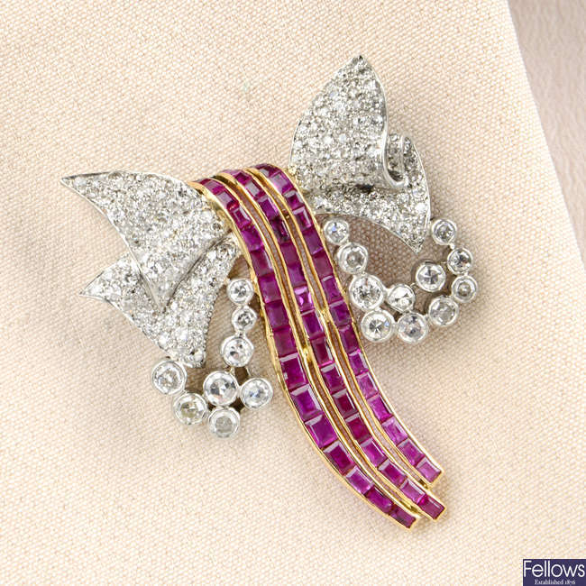 A mid 20th century platinum and 18ct gold ruby and diamond bow brooch.