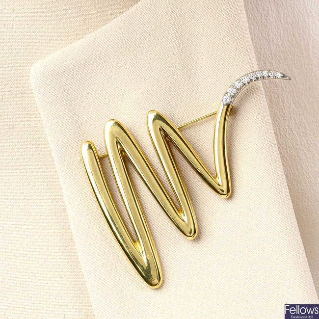 A brilliant-cut diamond terminal squiggle brooch, by Paloma Picasso for Tiffany & Co.