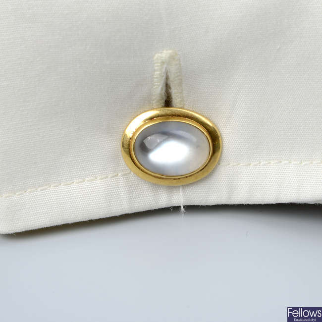 A pair of Edwardian 18ct gold moonstone cufflinks.