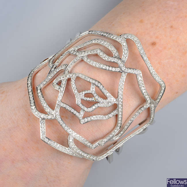 A pave-set diamond openwork rose cuff bangle, by Gavello.