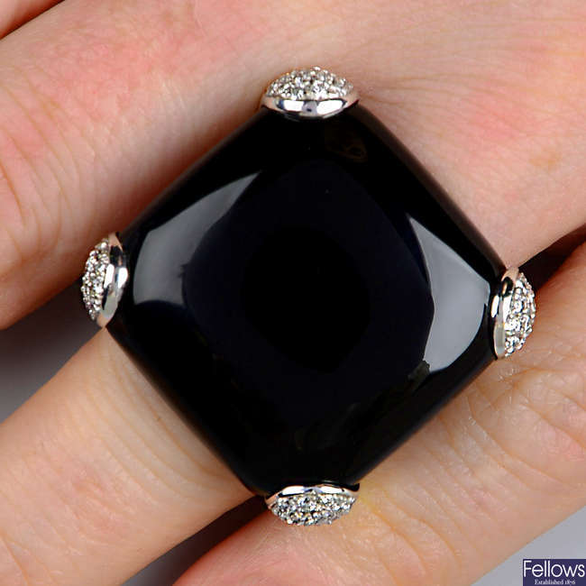 An onyx and diamond dress ring, by Gavello.