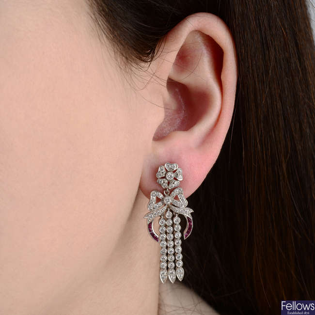 A pair of 18ct gold brilliant-cut diamond and ruby earrings.