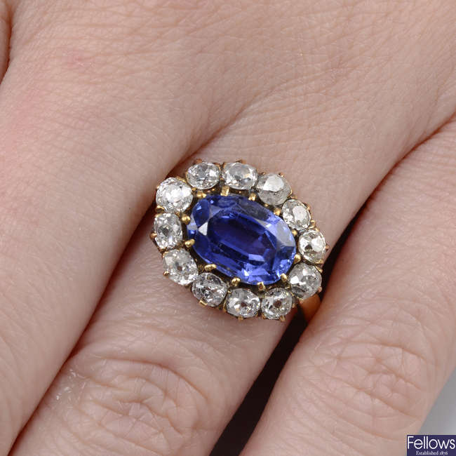 An early 20th century 18ct gold Sri Lankan sapphire and old-cut diamond cluster ring.