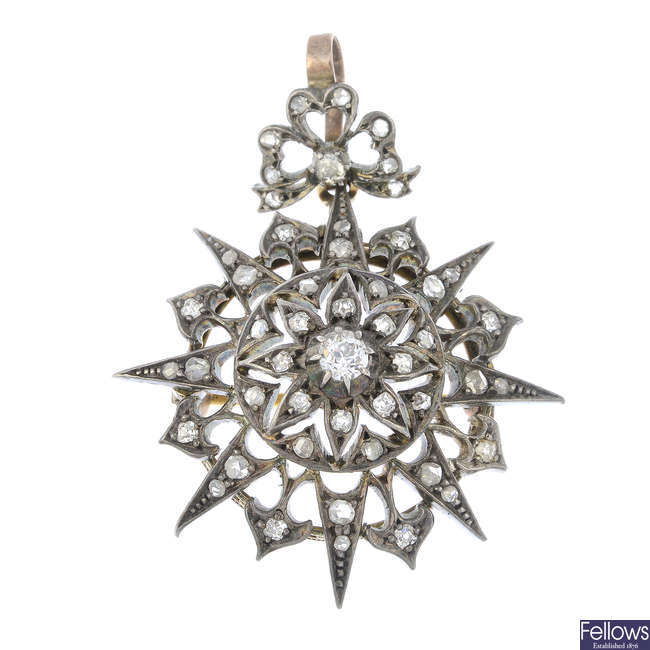 A late 19th century silver and gold old and rose-cut diamond pendant.