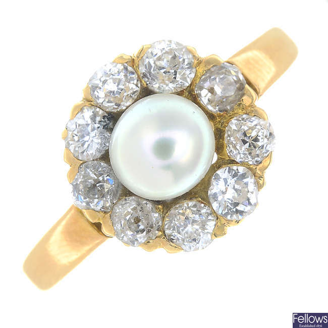 A late 19th century split pearl and old-cut diamond cluster ring.