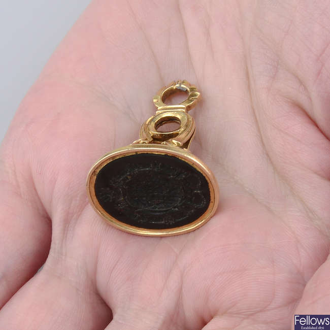 A Georgian 18ct gold carved bloodstone seal, carved with the coat of arms of Count Palatine of Zweibrucken-Birkenfield (1724-1764).