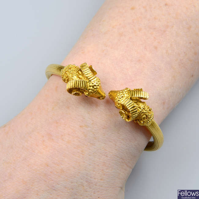 A ram's head hinged bangle, with ruby eyes, by Ilias Lalaounis.