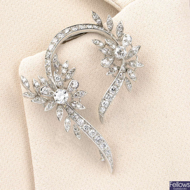A mid 20th century 18ct gold diamond floral brooch.