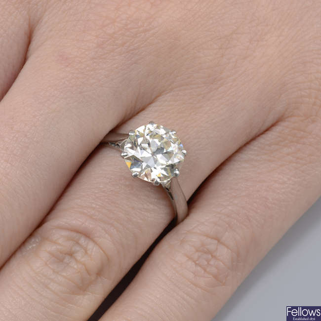 A mid 20th century platinum circular-cut diamond single-stone ring.