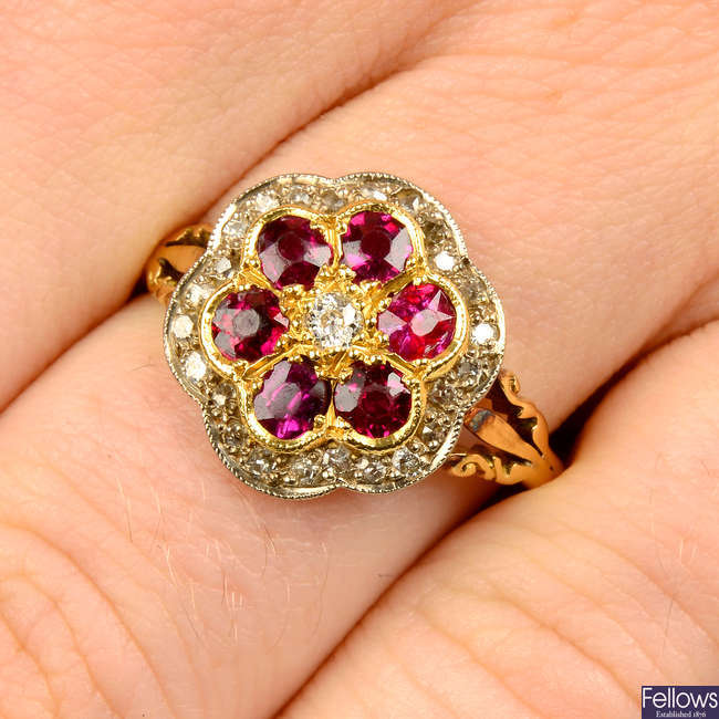 A ruby and vari-cut diamond cluster ring.