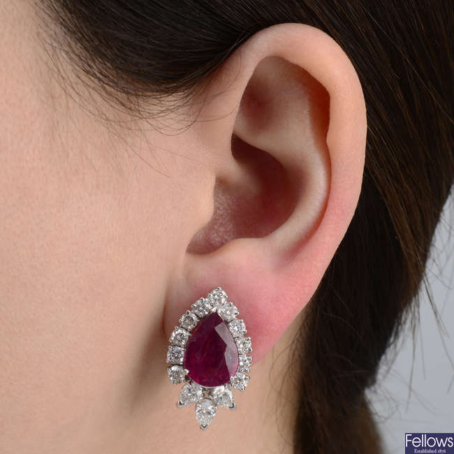A pair of ruby and vari-cut diamond cluster earrings.
