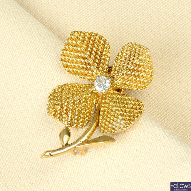 A mid 20th century 18ct gold diamond flower brooch, by Pierre Sterlé.