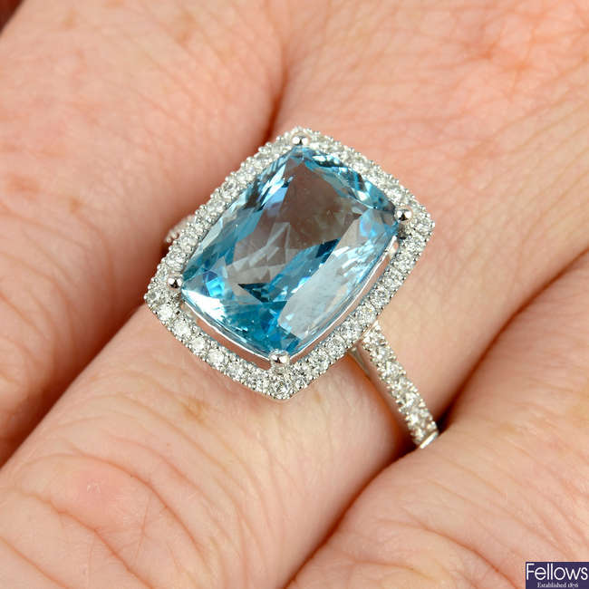 An 18ct gold aquamarine and brilliant-cut diamond dress ring.