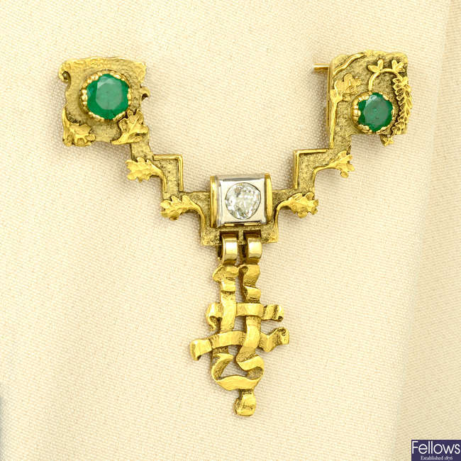 An emerald and old-cut diamond brooch.
