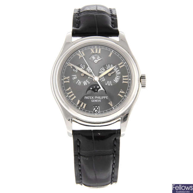 PATEK PHILIPPE - a gentleman's platinum Annual Calendar wrist watch.
