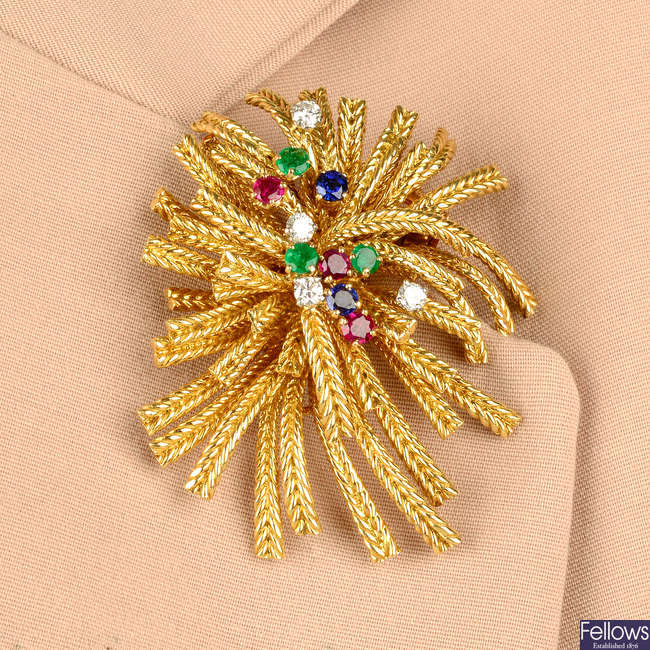 A mid 20th century 18ct gold ruby, sapphire, emerald and diamond spray brooch, by Cartier.