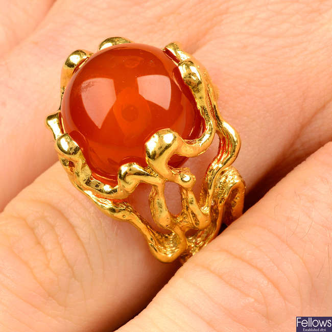A 1970s 18ct gold textured openwork panel ring with interchangeable agate spheres, by Gilbert Albert.
