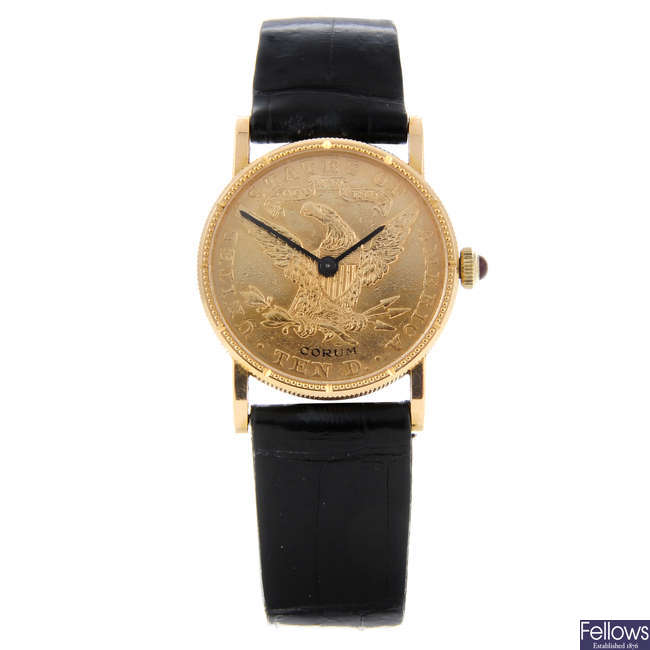 CORUM - a lady's yellow metal Ten Dollar coin wrist watch.