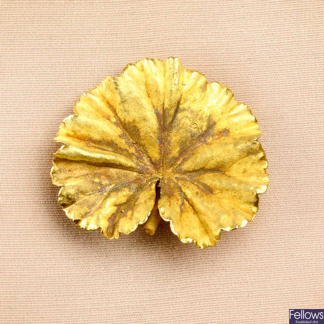 An 18ct gold naturalistic lotus leaf brooch.
