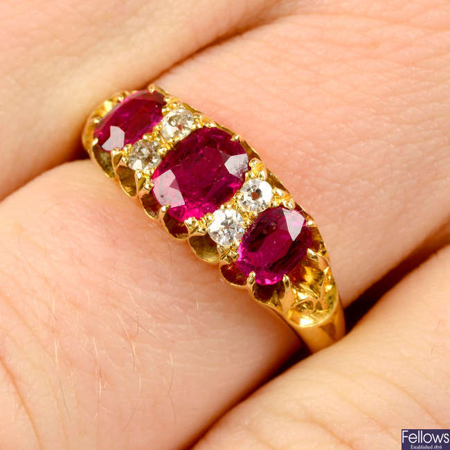 An Edwardian 18ct gold Thai ruby three-stone and diamond ring.