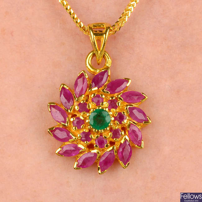 A ruby and emerald floral cluster pendant and chain, with matching earrings.