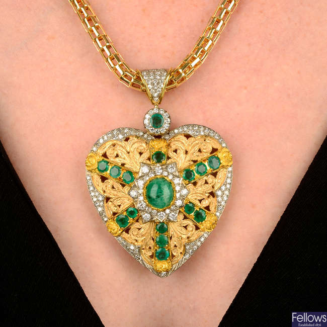 An emerald and diamond heart pendant, with fancy-link chain.