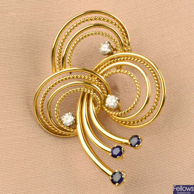 A 1950s 18ct gold sapphire and diamond rope twist brooch, with matching earrings, by Henry George Murphy.