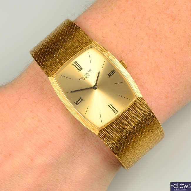 A gentleman's 1970s 18ct gold textured wristwatch, by Patek Philippe, ref. 3528/3.