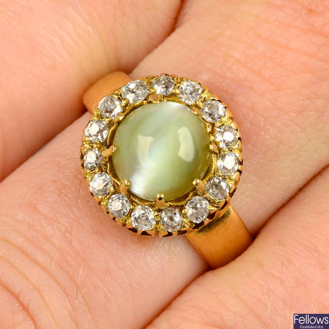 A late Victorian gold cat's-eye chrysoberyl and old-cut diamond cluster ring.