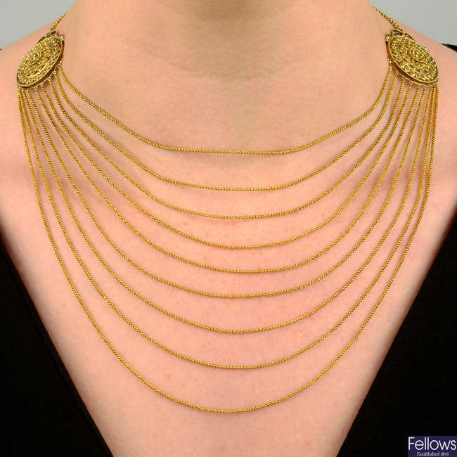 An early 19th century gold multi-strand filigree necklace.