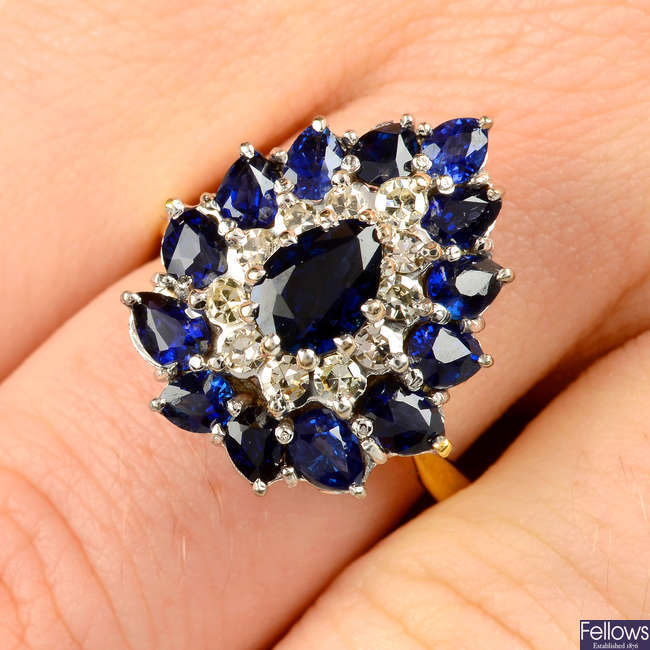 A sapphire and diamond pear-shape cluster ring.