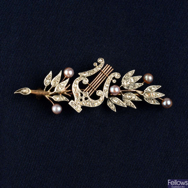 A late 19th century silver and 18ct gold, rose-cut diamond and pearl lyre and laurel branch brooch.