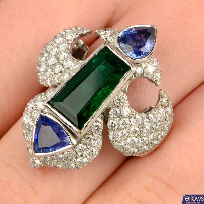 An emerald, sapphire and pavé-set diamond fleur-de-lis dress ring.