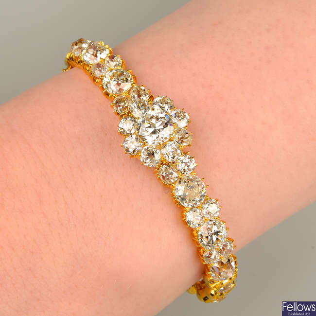 An old-cut diamond floral cluster bangle.