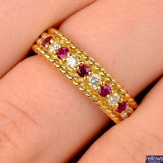 A brilliant-cut diamond and ruby rope-twist tapered band ring, by Dior.