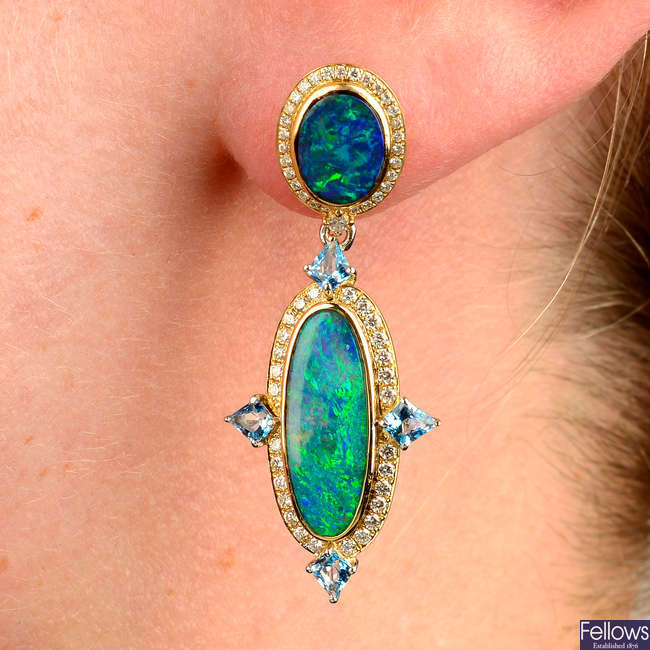 A pair of boulder opal, blue topaz and diamond earrings, by Fei Liu.
