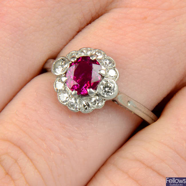 A mid 20th century platinum, Burmese ruby and vari-cut diamond ring.