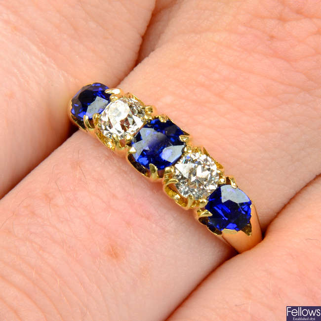 An early 20th century gold sapphire and old-cut diamond five-stone ring.