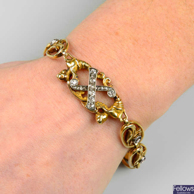 A Pre-Revolutionary Russian Art Nouveau gold diamond bracelet, with winged mermaid and wyvern head motif.