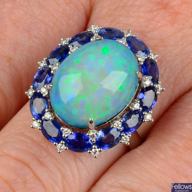 An opal, sapphire and diamond cluster ring.